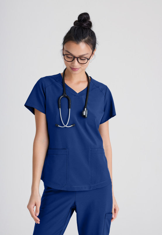 Grey's Anatomy Evolve 2 Pocket Piped V-Neck Top GSST180